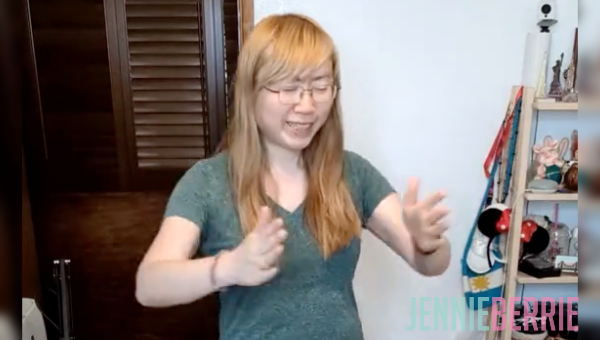 Person dancing to a trending quirky dance with a unimpressed dog lying on the floor